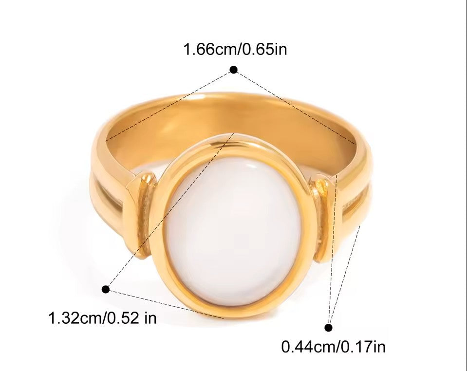 Gold ring with a white stone, showing measurements on a white background