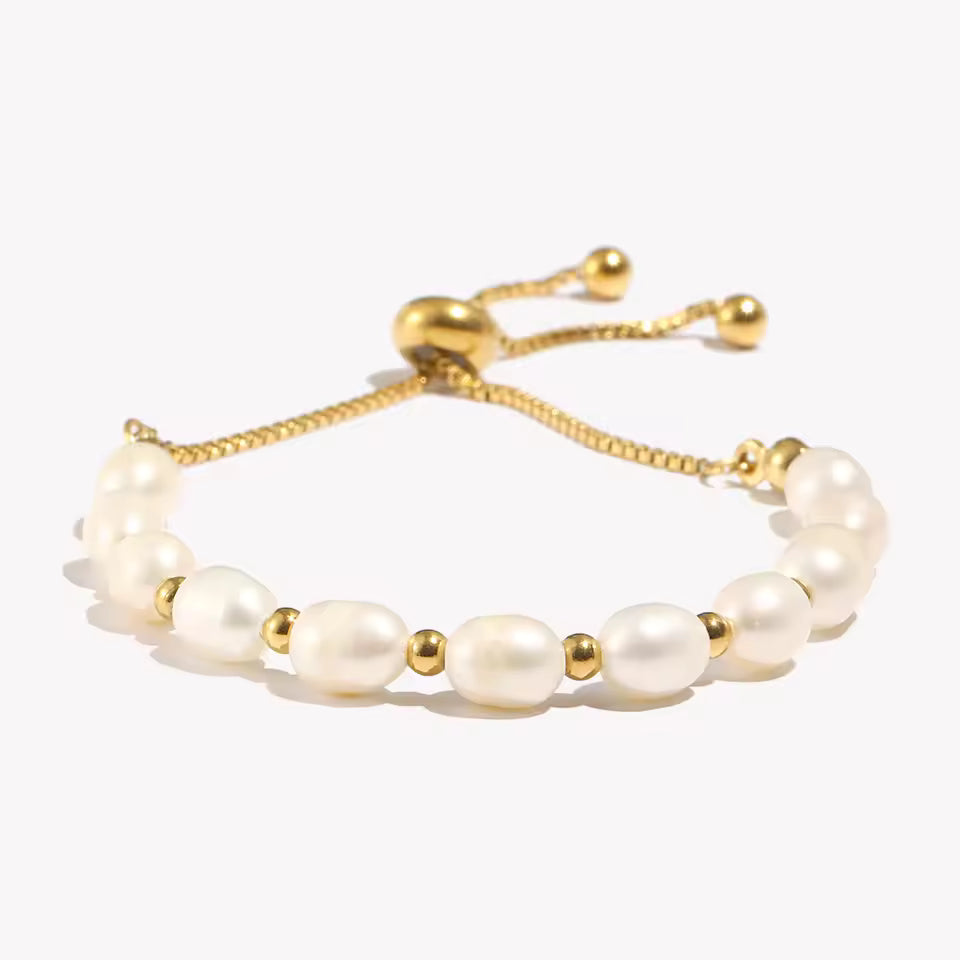 Gold and Pearl Adjustable bracelet on clear stand