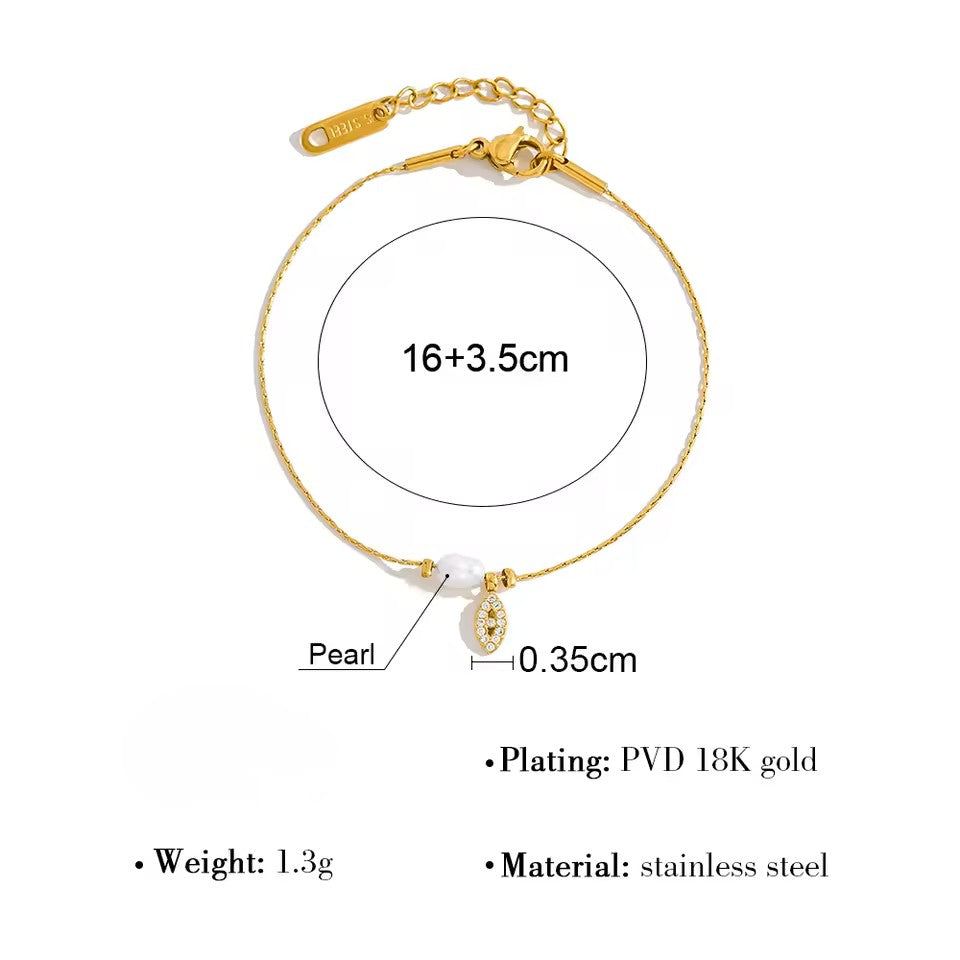 Gold bracelet with measurements and material details on a white background