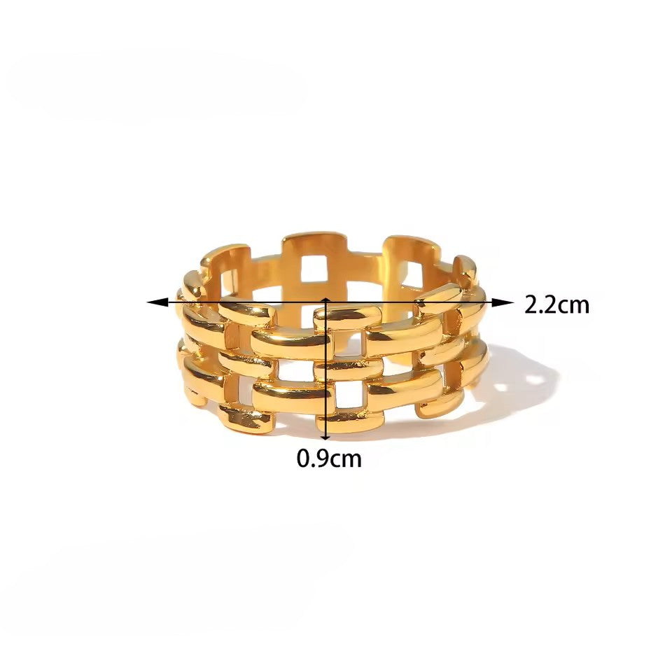 Gold chain ring with measurements on a white background