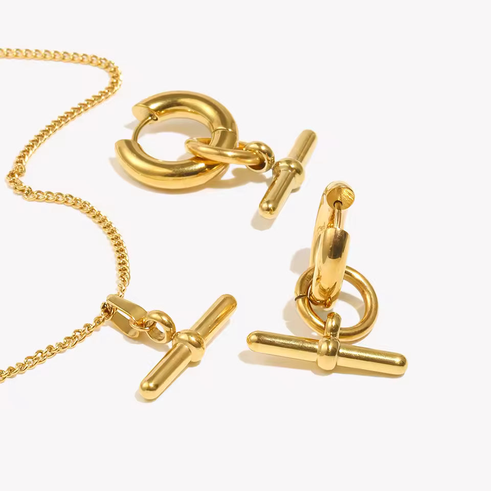 Gold T Bar Set White Background