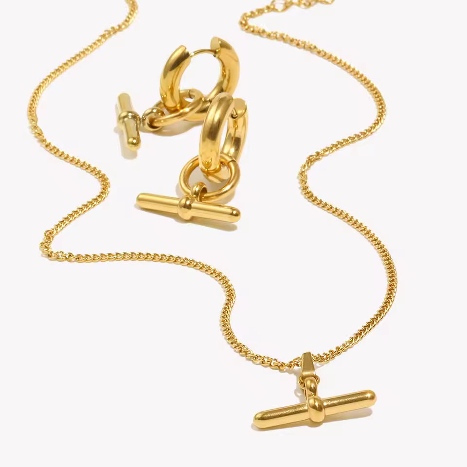 Gold T Bar Set White Background