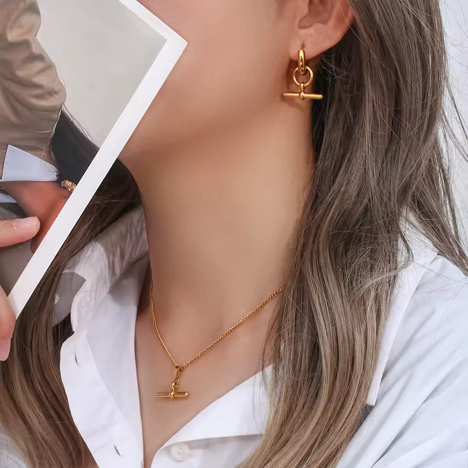 Gold T Bar Set Worn by a person