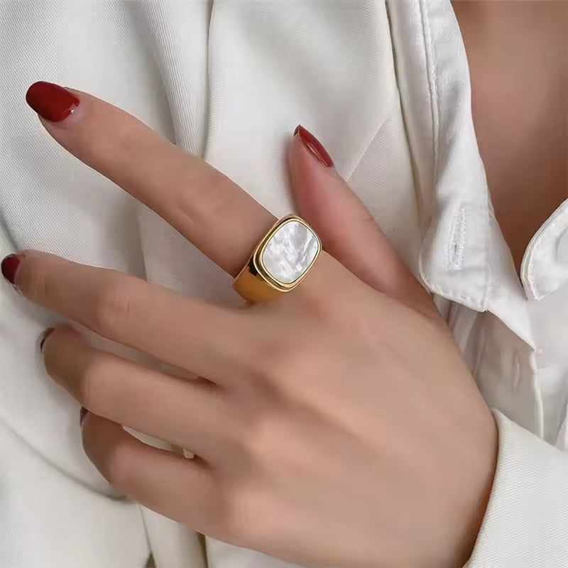 Gold Shell Signet Ring on Hand