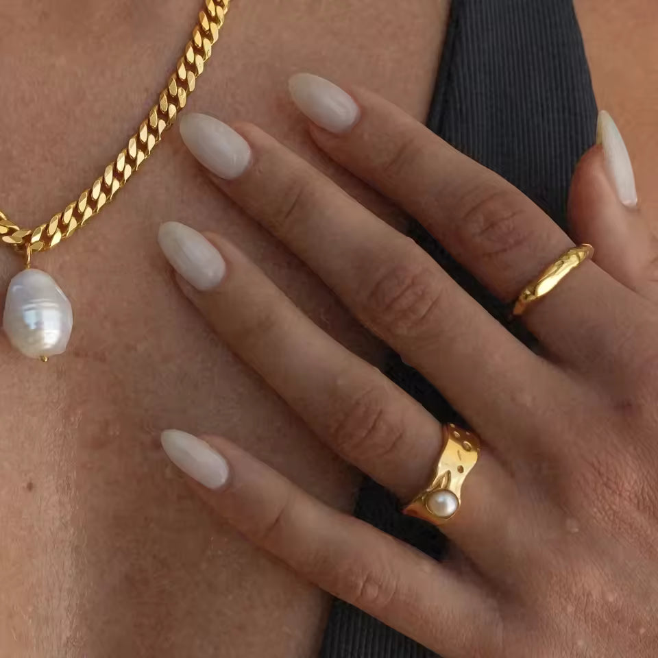 Pearl Gold Ring worn on hand