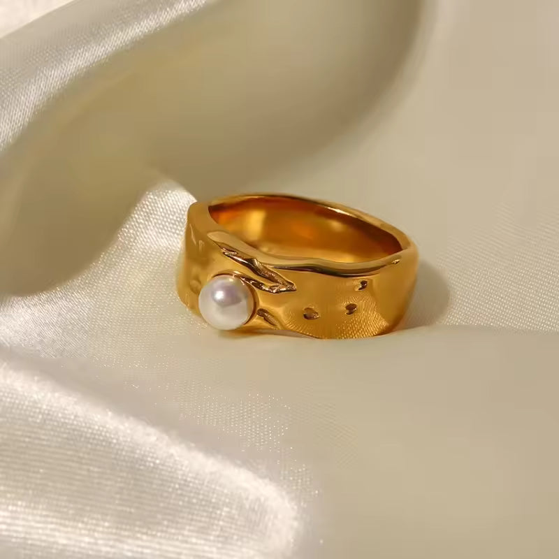 Pearl Gold Ring on fabric