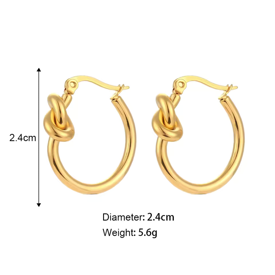 Gold hoop earrings with measurements on a white background