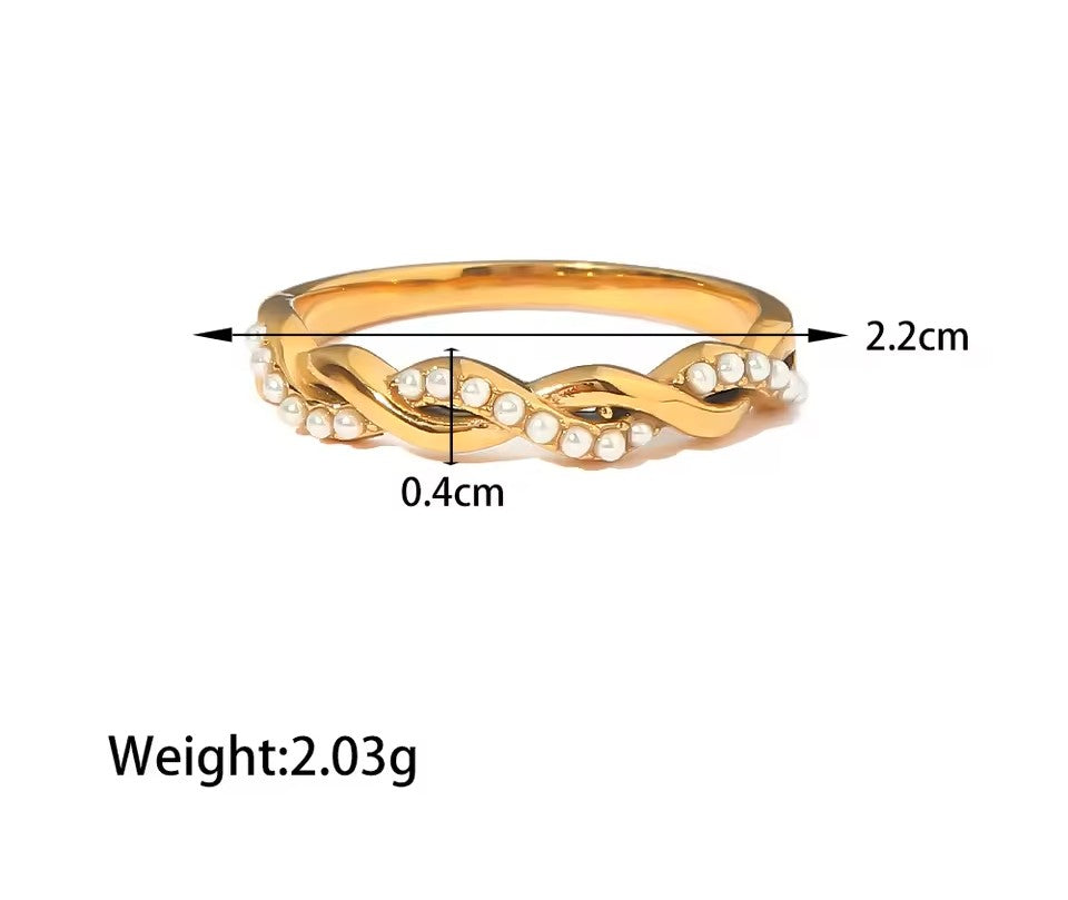 Gold ring with measurements on a white background