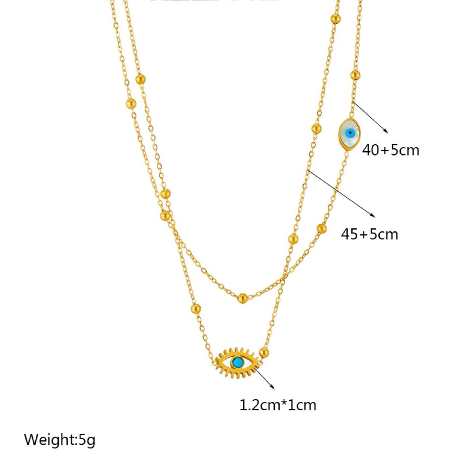Gold necklace with eye-shaped pendant and measurements on a white background