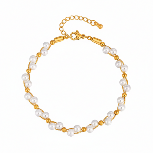 Pearl bracelet with gold chain on a white background