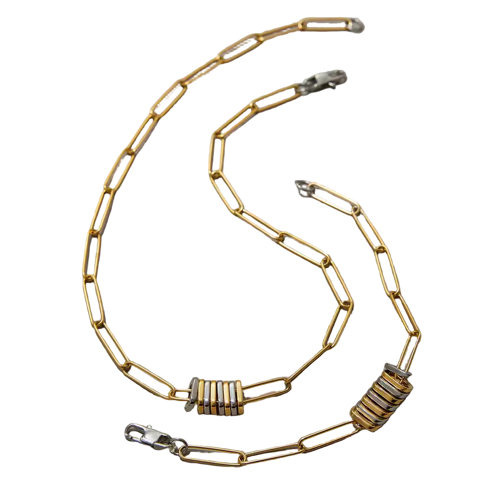 Gold chain with metal clasp on a white background