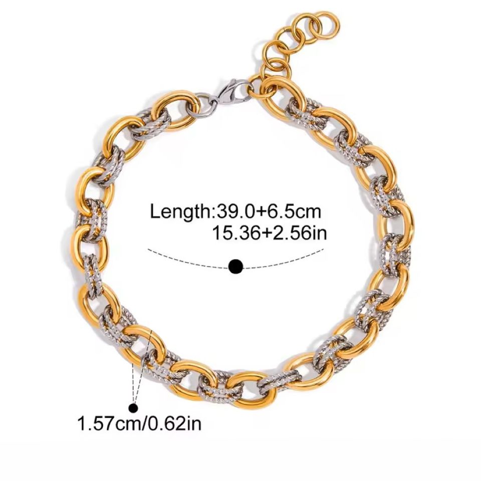 Gold and silver chain bracelet with measurements on a white background