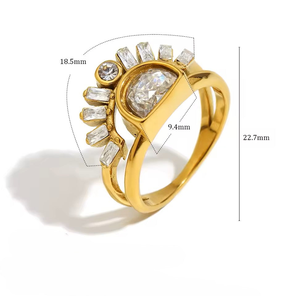 Gold ring with diamond accents and measurements on a white background