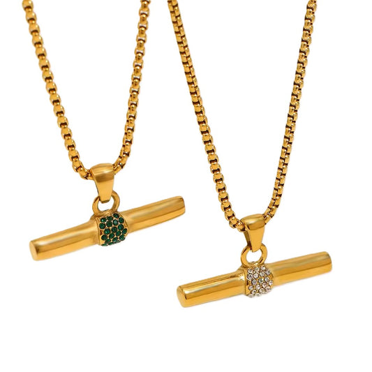 Two gold necklaces with cylindrical pendants on a white background