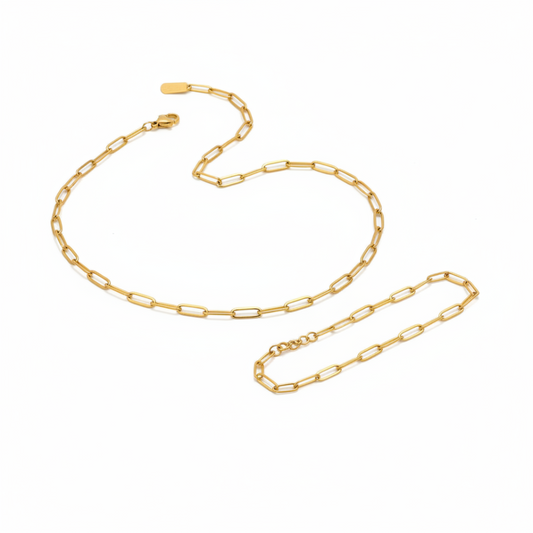 Gold chain necklace on a white background