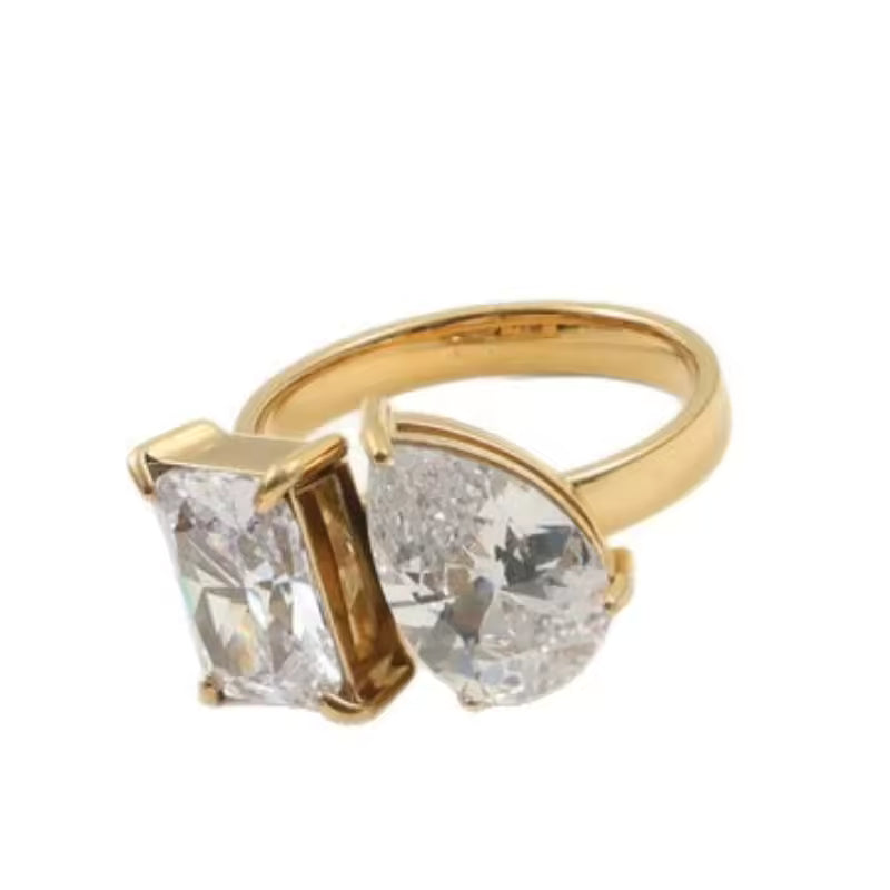 Ring with two cubic zirconia's on white background