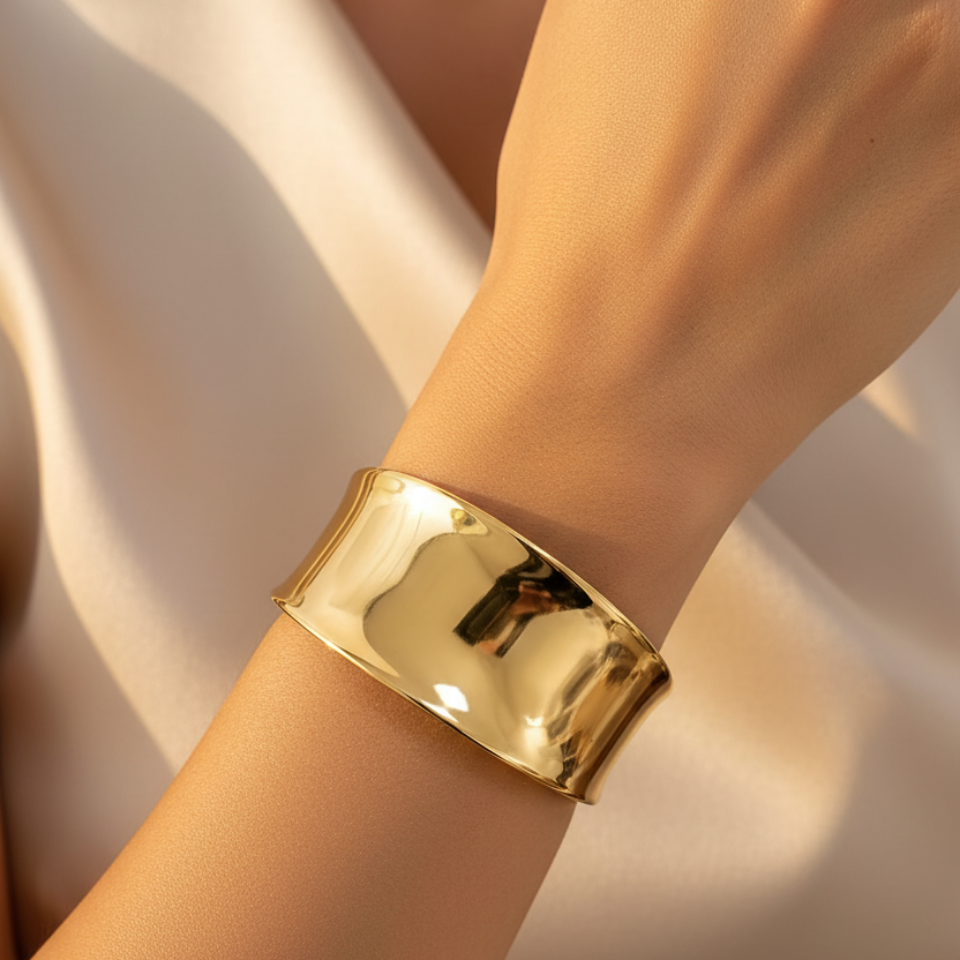 Girl wearing large gold cuff bracelet
