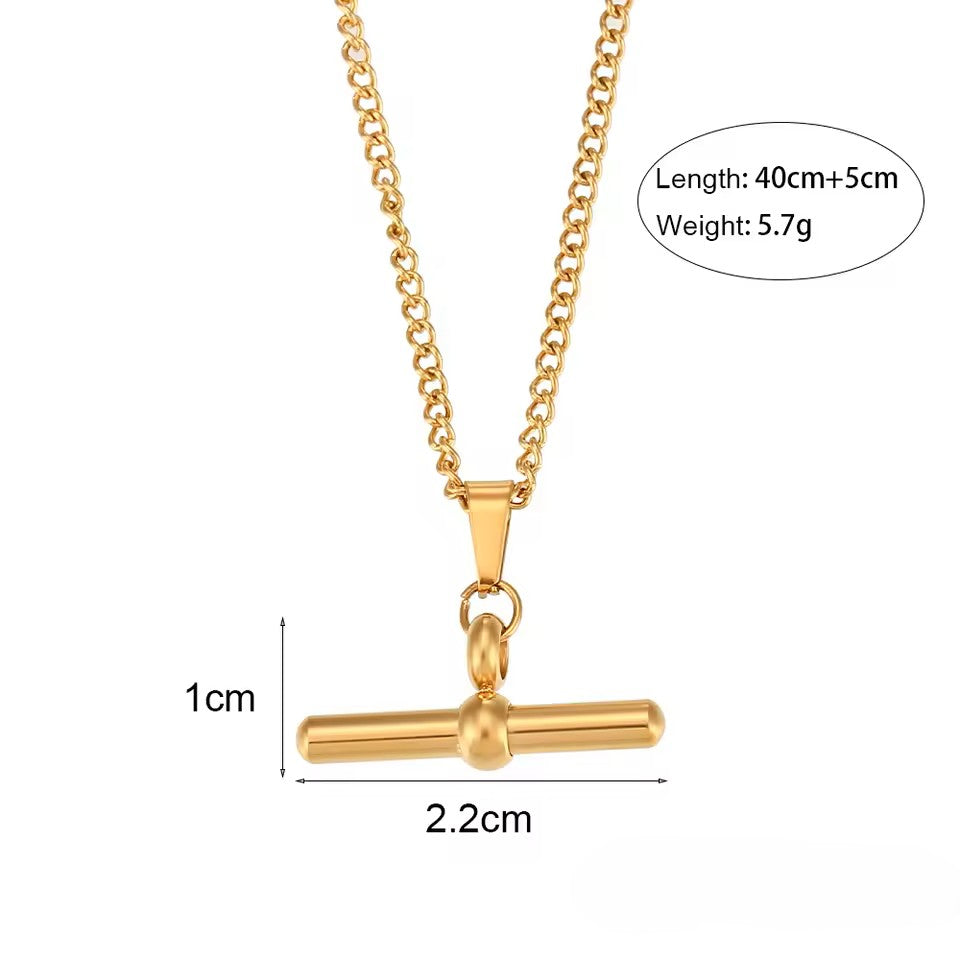 Gold necklace with a pendant on a white background