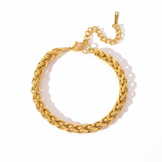 Gold chain bracelet on a white background