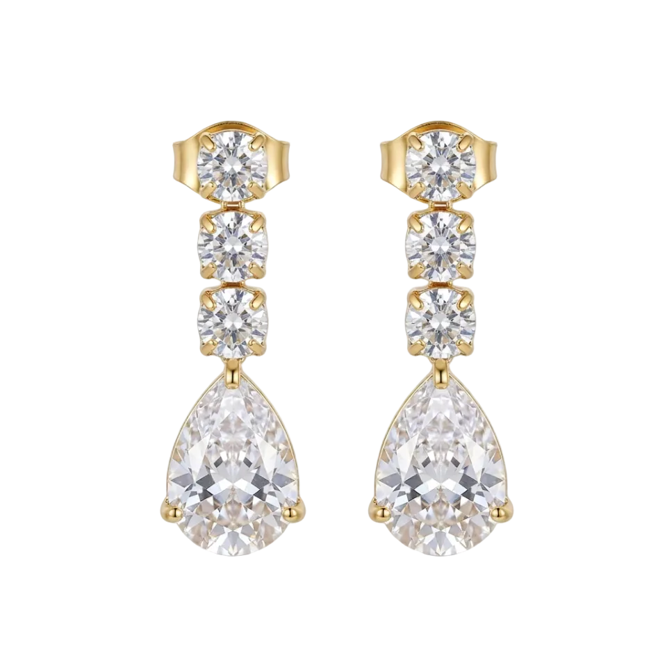 A pair of gold drop earrings featuring a vertical stack of clear teardrop and round crystals, with a larger teardrop crystal hanging at the bottom, displayed on a clean white surface.
