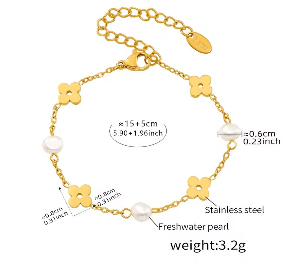 Gold bracelet with floral and pearl details, showing measurements and material information.