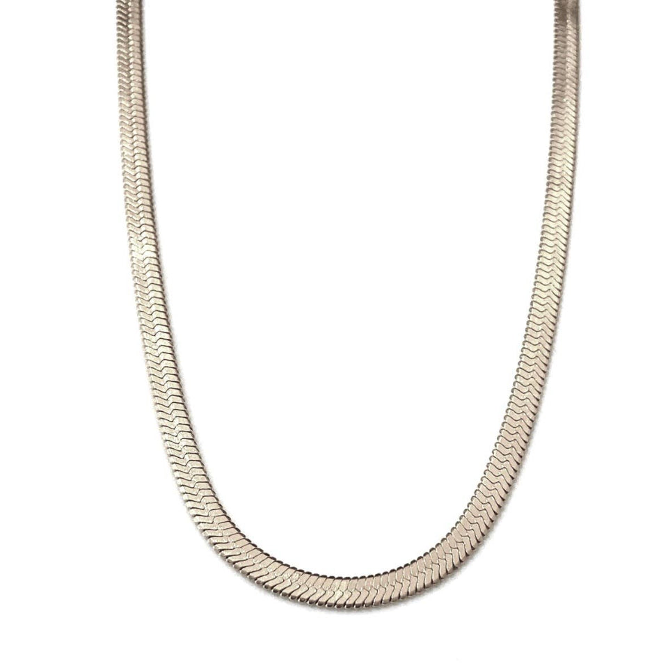 A silver-toned metal chain necklace with a textured, wavy snake-style link design, shown against a plain white background.