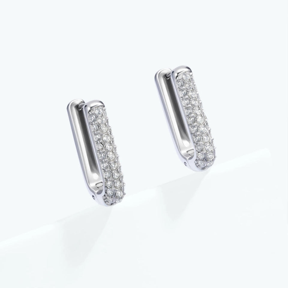Pair of silver pave earrings s on a white background