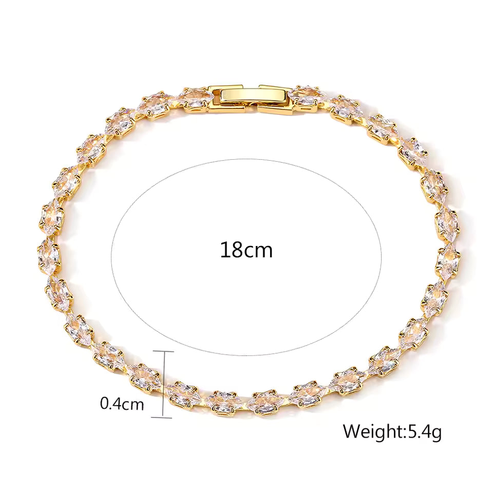 Gold bracelet with crystal stones, shown with measurements on a white background