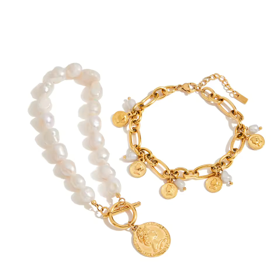 Two bracelets, one pearl and one gold with coins, on a white background